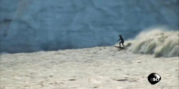 Watch These Surfers Ride a Glacial Tidal Wave