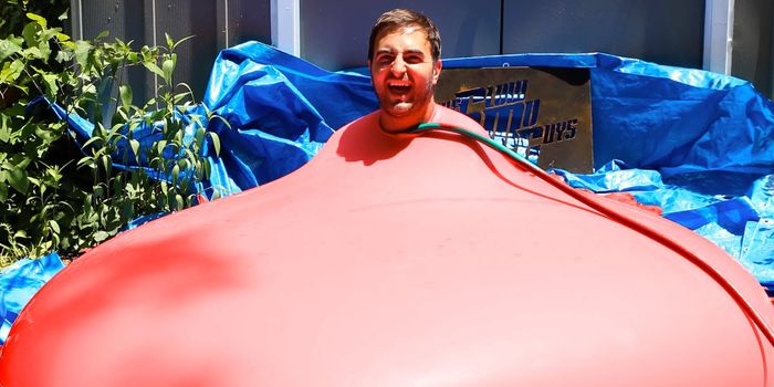 Watch This Life-sized Water Balloon Burst Before the Water Can Catch Up With it in Slow Motion