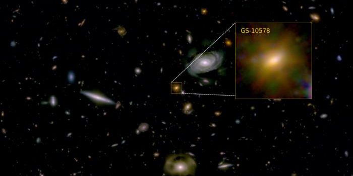 Dead galaxy spotted as black hole slowly starves it