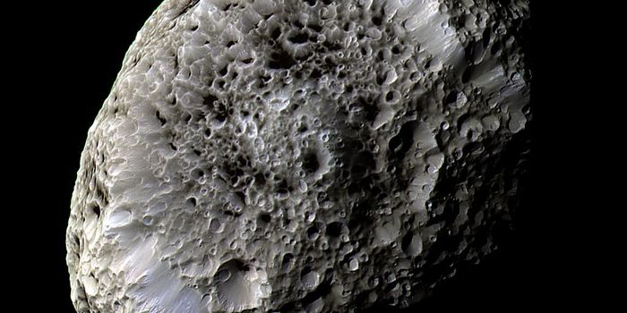 Saturn's Sponge-Like, Non-Spherical Moon, Hyperion | Solar System Moons