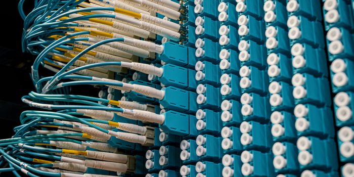 Fiber optic cables manufactured under pressure reduce signal loss