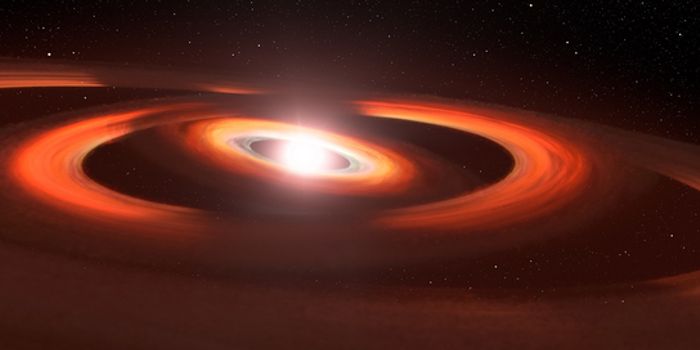 Hubble Observes Shadows from Misaligned Planetary Disks
