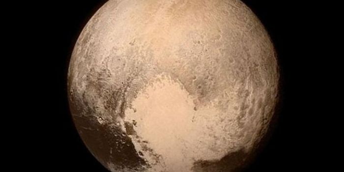 Historic Pluto Fly-By Via New Horizons Grabs Photos of Pluto's Surface