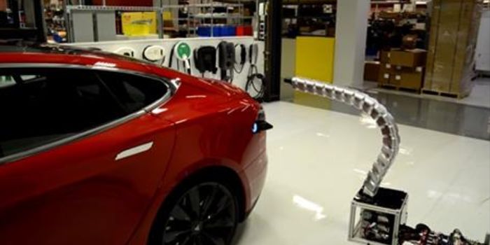 Check Out Tesla's Awesome New Robotic Electric Car Charger