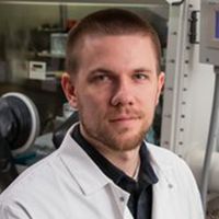 UV-absorbing Organic Materials for Transparent Photovoltaic Windows