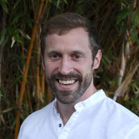 Harnessing Lattice Strain to Activate New Functions in Porous Materials